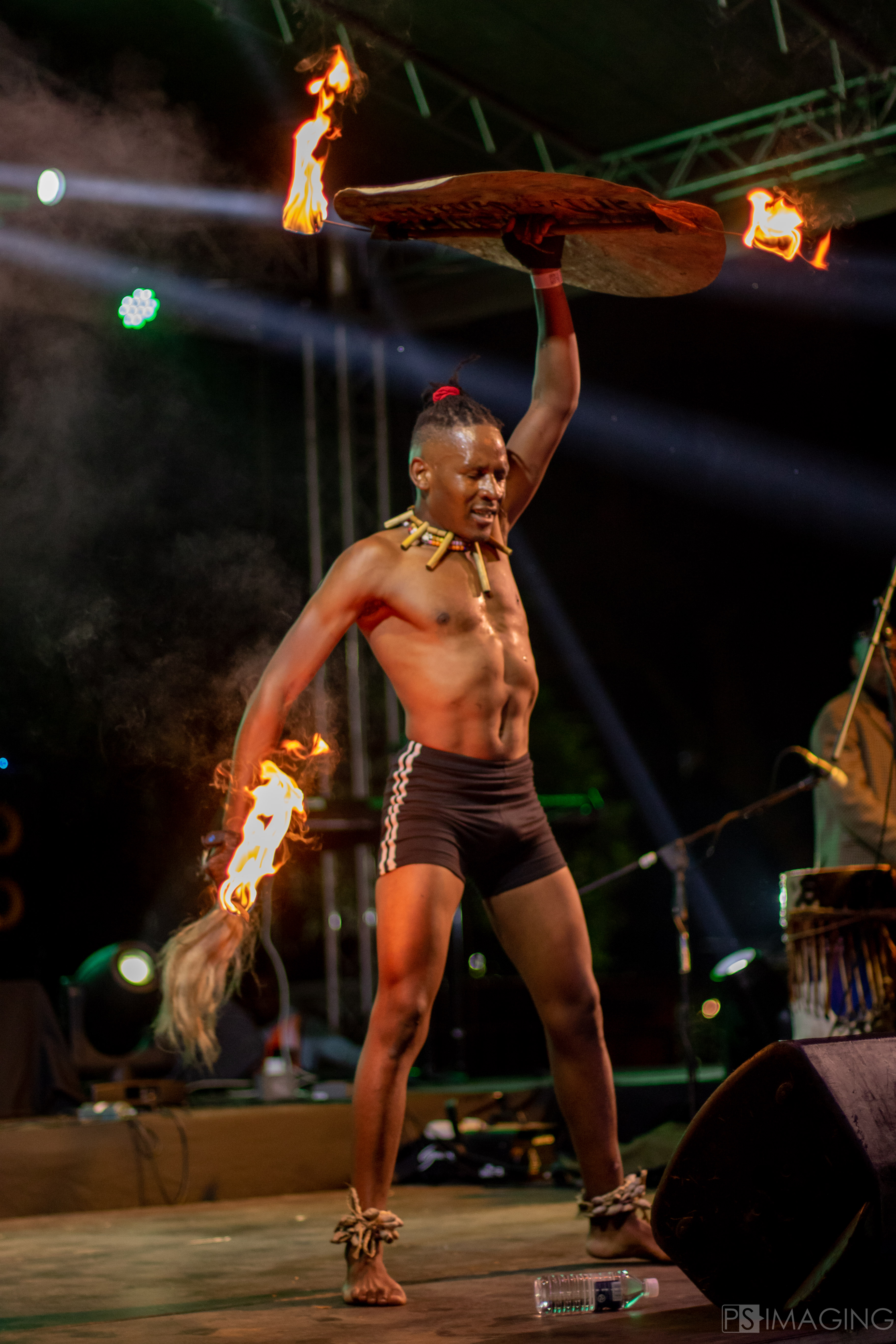 purple lighting and a croud of people